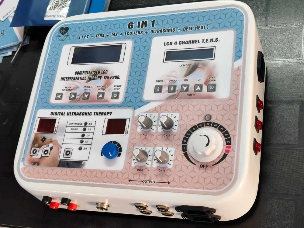 6-in-1 Physiotherapy Machine 6-in-1 Physiotherapy Machine by PHYSIOMODALITIES ENTERPRISES featuring IFT, TENS, MS125P, Ultrasonic Therapy (US), Heat Therapy, and LCD TENS for physiotherapy and rehabilitation.