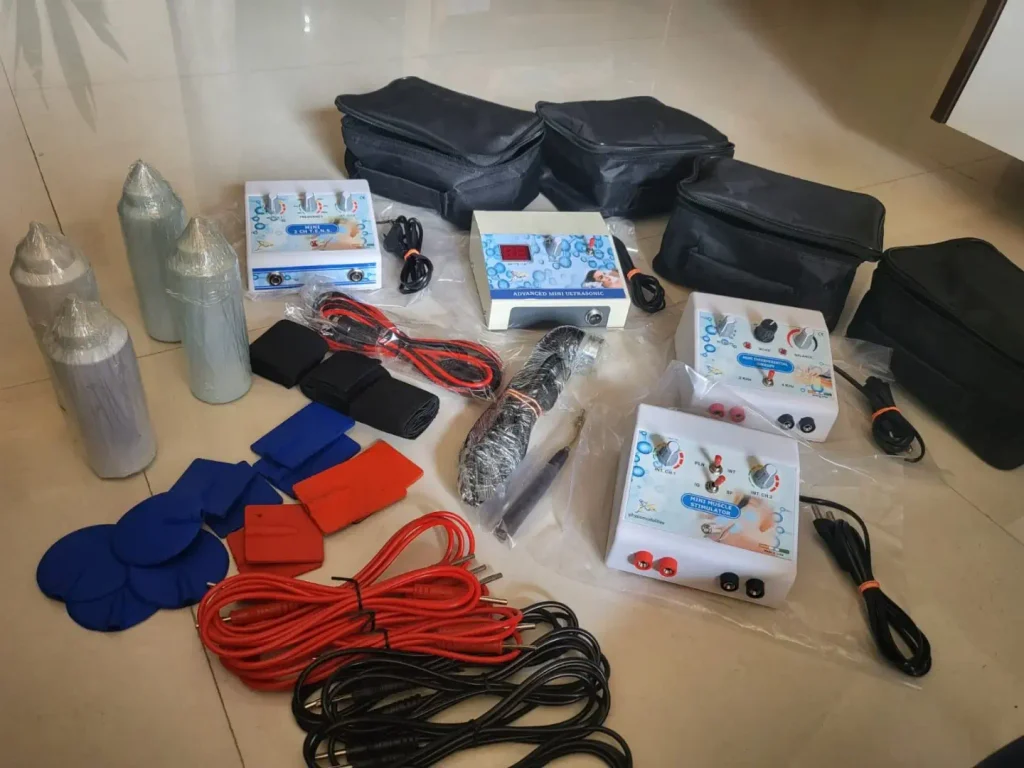 Physiotherapy equipment kit with TENS machine, muscle stimulator, mini ultrasound machine, electrodes, cables and accessories