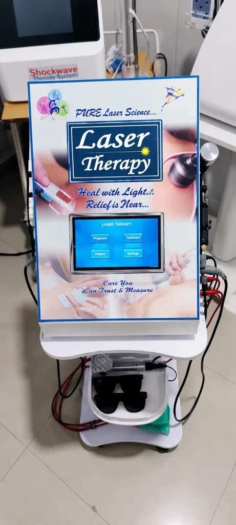 Advanced Digital Laser Therapy Machine Advanced digital laser therapy machine with touchscreen control panel, laser treatment applicator, connecting cables, protective eyewear, and mobile equipment stand for professional physiotherapy use.